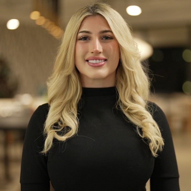 Portrait of Amber Scapellato, founder